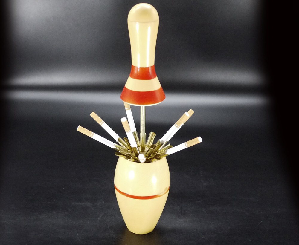 Strike Gold with the Vintage Bowling Pin Lighter & Dispenser